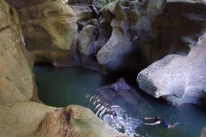 Cave Adventure - Charco Azul Caves, Canyon & Waterfall Adventure - Arenales Caves underground river swimming: life jackets and real traction