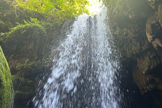 Charco Azul, Hidden Caves, Waterfalls, Beach, Free Adult Drinks - Charco Azul canyon: blue water, slippery rocks, and jump-or-chill choices