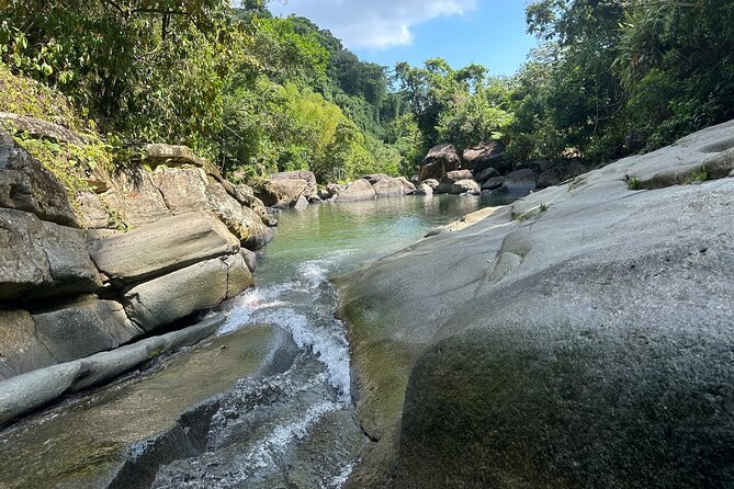 El Yunque & Beach Tour: Waterslide, Waterfall, Food, & Photos - What to Bring for the Natural Slide, Not Just for a Beach Day