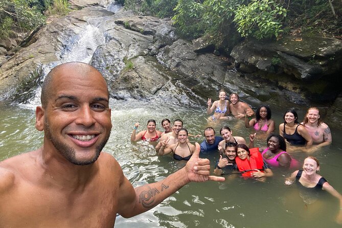 El Yunque & Beach Tour: Waterslide, Waterfall, Food, & Photos - El Yunque River Play: Waterslide Energy, Real Safety