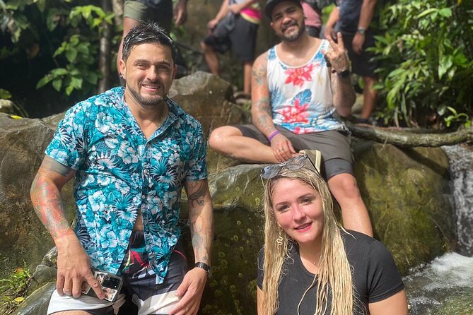 El Yunque Hike Adventure to Las Tinajas Waterfall from Fajardo - Guides make the difference on wet rock
