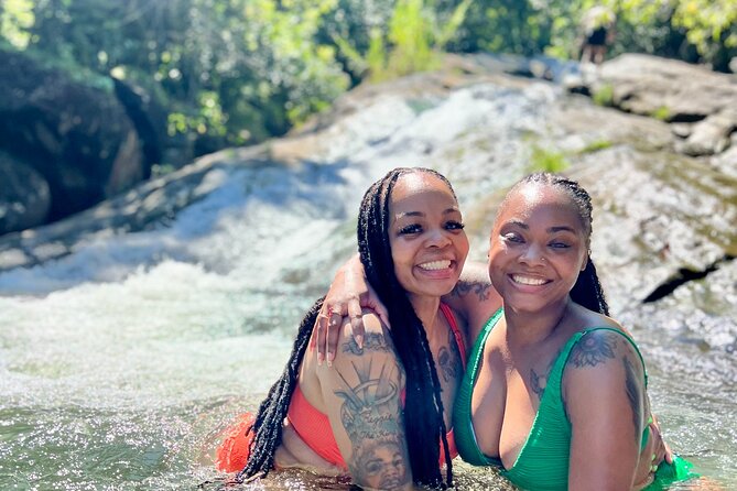 El Yunque Waterslide and Waterfall Tour with Food and Photos - Guides, photos, and why this tour is more than a slide