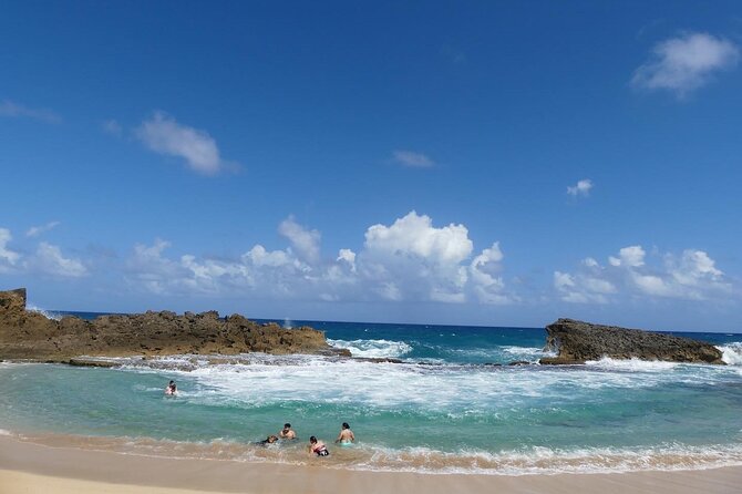 Hidden Fresh Spring of Water+ Cave+ Beach & Food Full Day Tour - Playa Mar Chiquita snorkeling: warm water, fish spotting, and palm-tree breaks