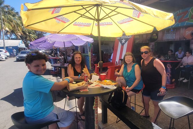 Private MEGA El Yunque Full Day Tour: Rainforest, Rivers, Beaches - Luquillo beaches: kiosk rows, warm calm water, and classic Puerto Rican sea time