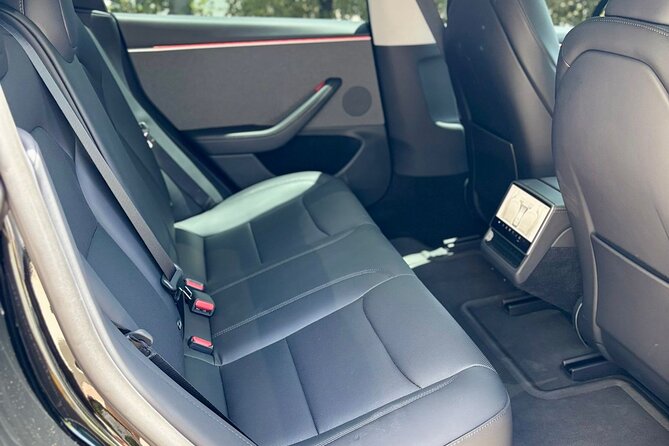 Puerto Rico Island Wide Private Transfers, Tesla 3 Luxury Sedan. - Why a private transfer beats taxi roulette in San Juan