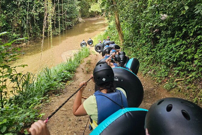 Rainforest Cave Tubing Experience - Stop 1 in Charco Azul Canyon: tubing, caves, and rainforest time