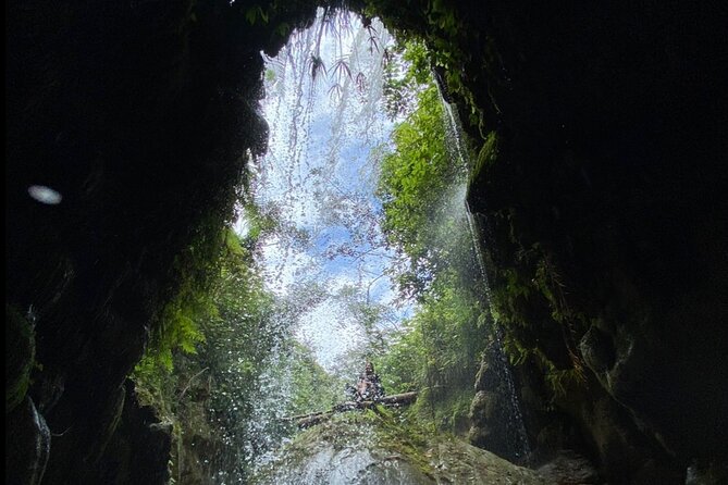 Rainforest Caves and Waterfalls Exploration with Transportation - The bonus stops: petroglyphs, rock movement, and waterfall moments