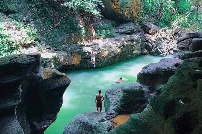 Rainforest Caves and Waterfalls Exploration with Transportation - What to bring: shoes, a waterproof phone plan, and wet-day reality