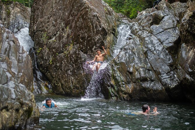 Top Rated El Yunque Rainforest & Waterslide – SmallGroup Tour - The second watering hole: natural rock slide and cliff jump options